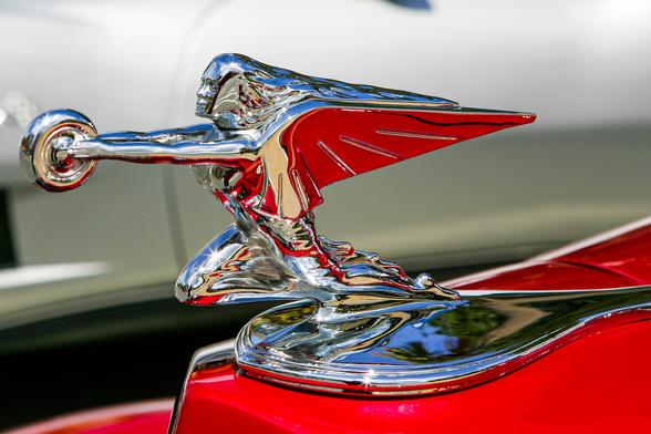The hood ornament of a 1937 Packard 115C