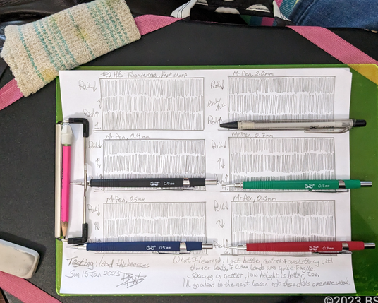 A sketch practice pad with 3-row hatching in each of six boxes, along with mechanical pencils in five sizes; with the date, artist's signature, & personal notations across the bottom.