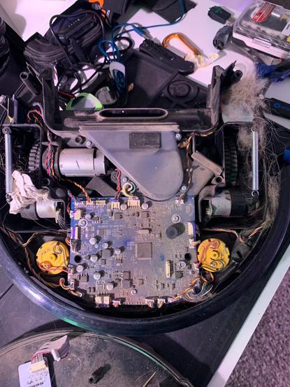 Inside of the robot was a wad of paper causing a very loud noise and a ton of dog hair clogging parts of the robot.