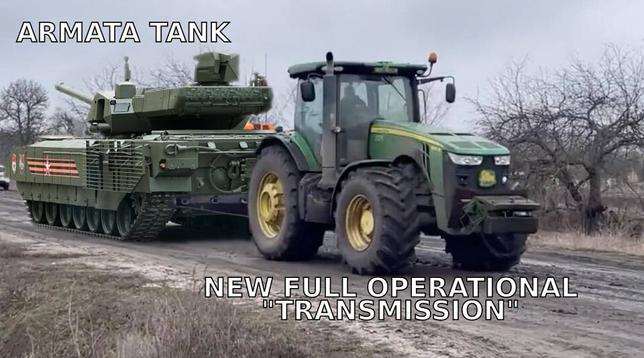 "gimp shop" of a tractor pulling a armata tank
text: armata tank
text next to tractor: new full operational "transmission"