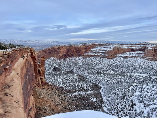 Colorado Monument viewpoint over a snow-covered canyon