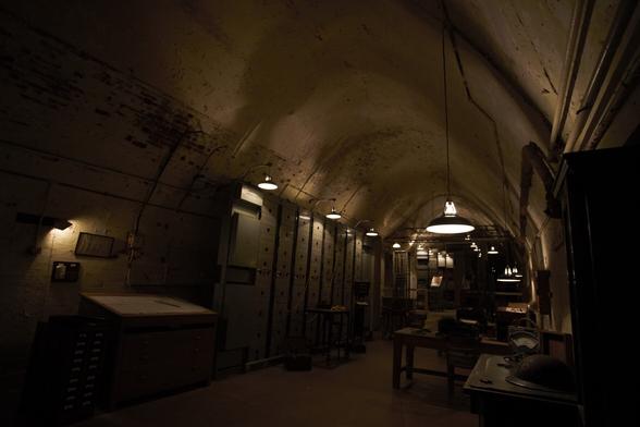 A photo for #SubterraneanSaturday of a section of tunnel you can actually visit deep beneath #DoverCastle in #Kent. This is a photo of the #TelephoneExchange in the #Casemate #Level of the #tunnels. Rare to see it without the public.

Photo is of a wide section of concrete lined tunnel containing banks of old exchange machinery from WWII when these tunnels were used as a high security command centre deep within the chalk cliffs beneath Dover Castle.

A - Annexe was used as a military hospital/dressing station.

B - Bastion has 'officially' never been found, although I know where the entrance is supposed to be they won't grant permission to explore quoting everything from bubonic plague to mass war grave.

C - Casemate was a general staff area, communications, mapping rooms, officers quarters, even a BBC studio.

D - DUMPY or Deep Underground Military Position Yellow was a top secret bunker where even Churchill went to make plans for the allies and latterly converted to nuclear bomb proof allegedly.

E - Esplanade the castle rarely comment on, and at last attempt, still denied it even exists, it does I've explored all of it and have the pics to prove it.