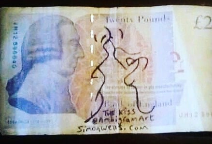 A pen drawing of a couple kissing on a £20 note