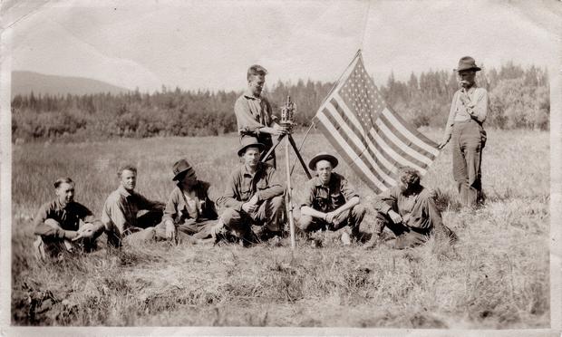 Surveyors and flag.