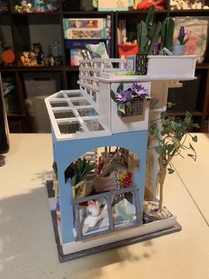 Right side changes to the bay window, made it with gray painted dowels instead of the wires the pattern called for. Also added an extra green and white pillow
