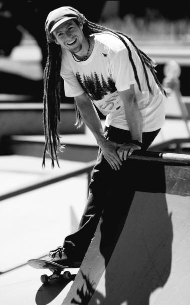 TJ Watts, after a good skateboard run. B/W photo.