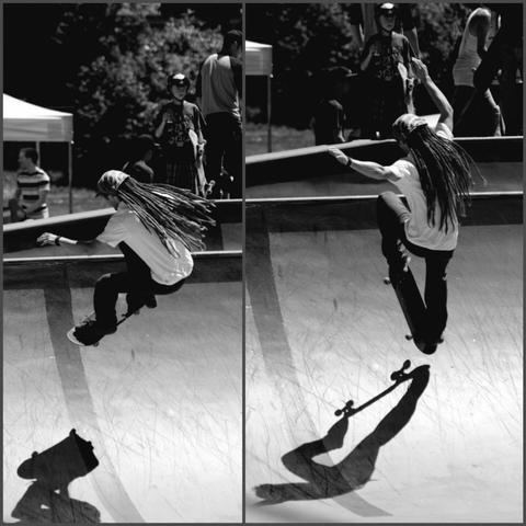 TJ Watt, with skateboard in mid air - skating the bowl. B/W photo.