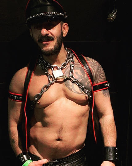 Partial nude leather gay man