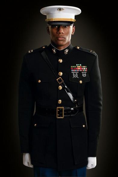A Black US military service member in formal uniform.