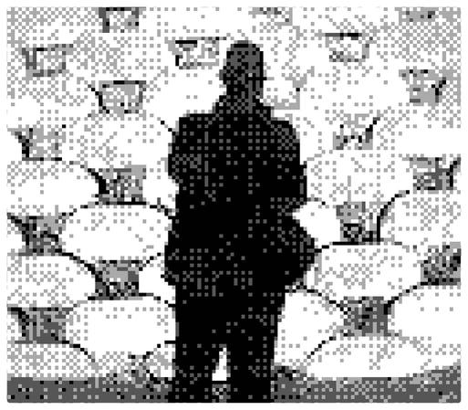 Silhouette of a body (your funtographer holding his Gameboy) against a wall made of large rounded bricks. This is actually the retaining wall outside our local neighbourhood Lidl.