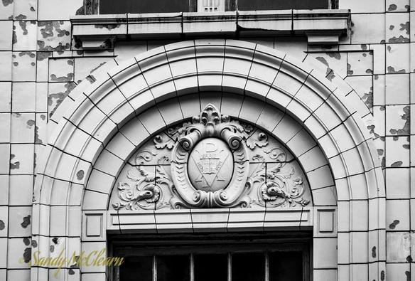 Stonework archway over a doorway.
