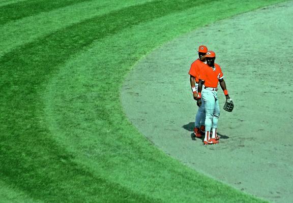 Reds SS Barry Larkin and OF Roberto Kelly during the All Star Workout at Camden Yards.

Larkin played 19 years with Reds and won a NL MVP, was a World Series champion and won 9 Silver Sluggers, 3 Gold Gloves and he was a 12x All Star while amassing 2340 hits. He is in the Hall of Fame.

Kelly played 14 seasons with 8 teams and was a 2x All Star. As a coach with Giants he won 3 World Series championships.