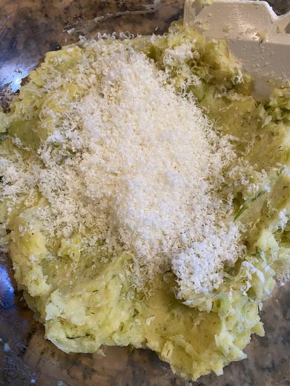 Once mixed, the cheese is added to the colcannon mixture