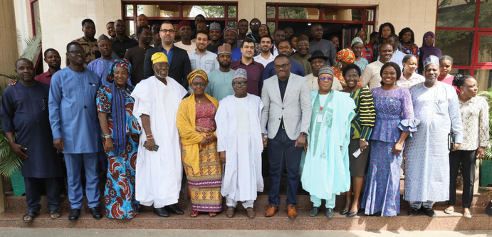 WorldPop research fellows, Chris Nnanatu, Sarchil Qader and Ortis Yankey with a delegation from the Nigerian National Population Commission. Abuja, Nigeria, 9 February 2023.