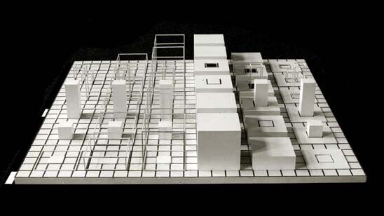From MoMA's artwork description:

"Serial Project, I (ABCD) combines and recombines open and closed enameled aluminum squares, cubes, and extensions of these shapes, all laid out in a grid that rests on the floor."