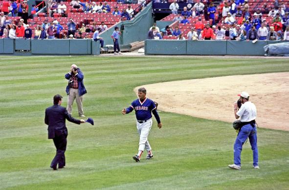 Hall of Fame member Carl Yastrzemski walks out to left field. Yaz, who succeeded Williams in left field for the Red Sox, is one of three Boston left fielders in the Hall