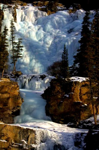 Tangle Falls - frozen over in Winter.  Beautiful glacial blue colours in the ice.