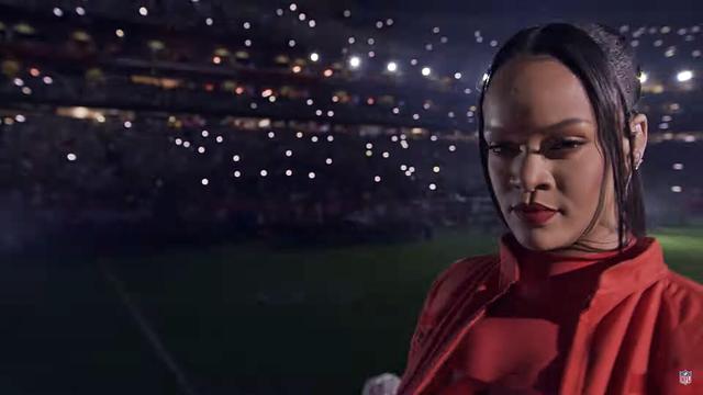Rihanna stares intensely into the camera during the Superbowl Halftime Show