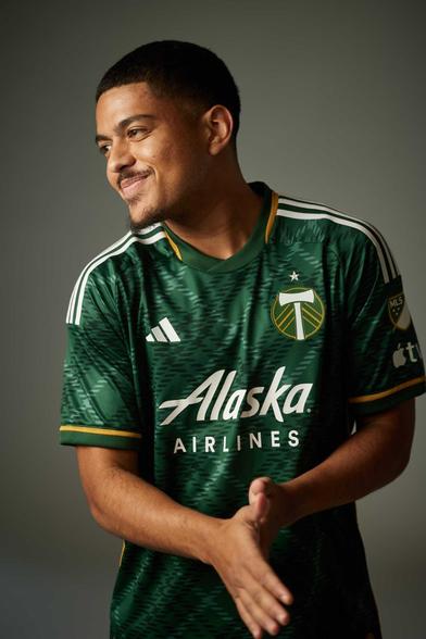 Evander poses in the new Portland Plaid kit