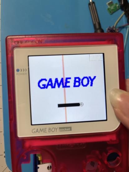 The same Game Boy in the previous picture showing the Color screen placed inside the Pocket shell
