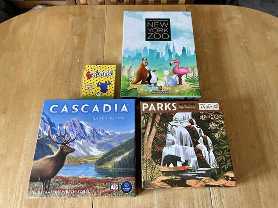 Boxes for the board games 6 Nimmt, Cascadia, Parks and New York Zoo.