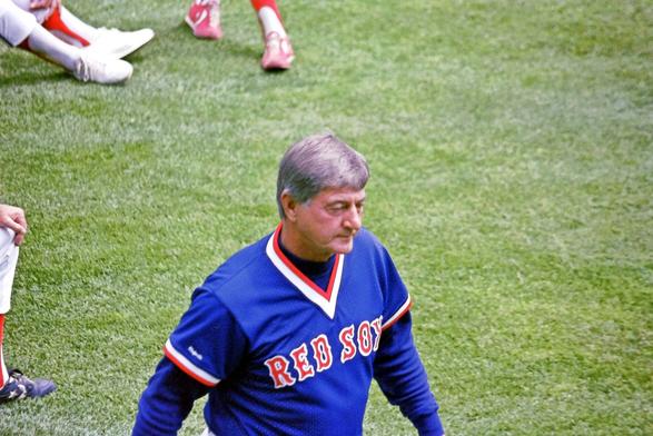 Hall of Fame outfielder Carl Yastrzemski in his old haunt of left field at Fenway Park in Boston during Old Timers Day 1992. Yaz played 23 seasons all with the Red Sox. He was the first AL player with 3000 hits and 400 home runs. He finished with 3419 hits. 452 homers, 1844 RBI and a career .285 batting average. He was AL MVP in 1967, MLB POY, a Triple Crown winner, an 18x All Star with 7 Gold Gloves and 3 batting titles. 

Before David Ortiz he was the most clutch player in Red Sox history.