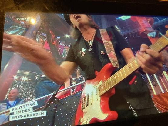 Die Räuber Live man sieht den Gitarren Mann und das WDR Logo