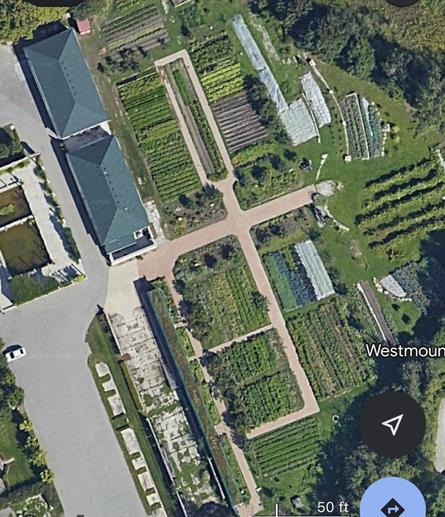 Google Maps aerial view of beautiful extensive vegetable gardens and fruit orchards.