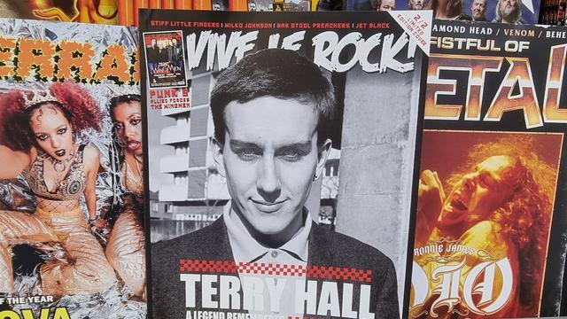 Music magazines with the UK punk, post-punk and indie magazine Vive Le Rock positioned at the centre with the metal titles Kerrang and Fistful Of Metal on either side. Vive Le Rock's cover features a black and white photo of a young Terry Hall from The Specials, who passed away just before Christmas.
