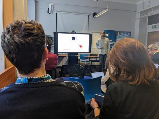 The audience looking at a presentation