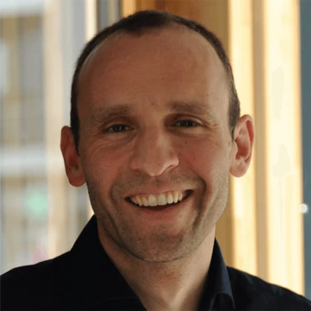 A closeup headshot of Carsten Marr