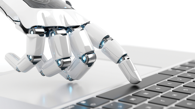 robot hand pressing the spacebar on a laptop keyboard