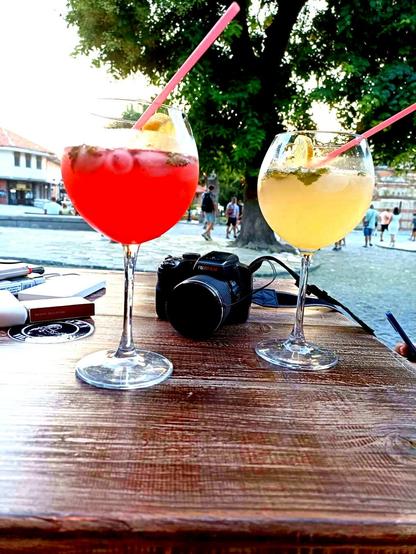 a table with 2 glasses of cocktails Nessebar Bulgaria on a hot summer day
