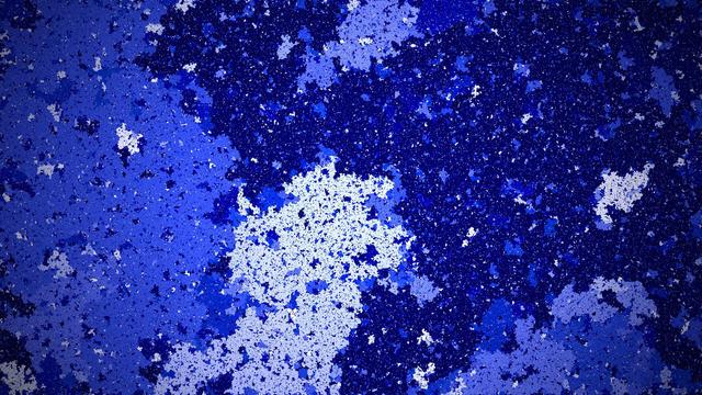 a fractal-esque image where connected pixels are grouped into islands of all sizes and colored with some shade of blue