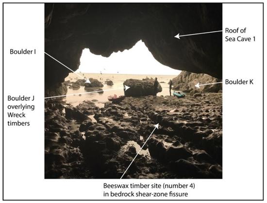 View from back of cave at Smuggler Cove showing locations of rockfall debris.
