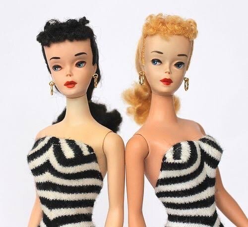 The original Barbie dolls came as either a brunette or blond wearing black and white swimsuits