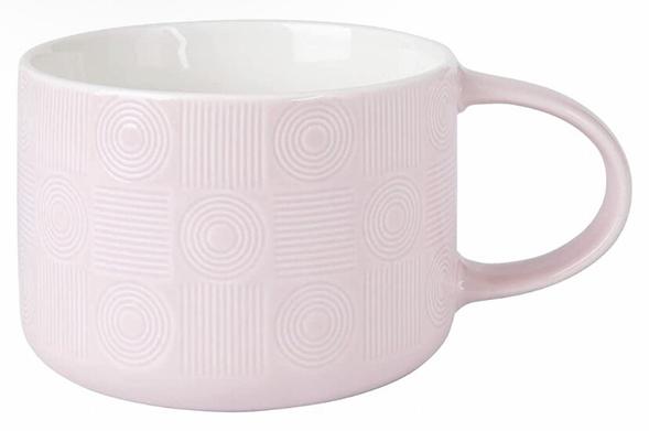 A very large, pale pink, more squat looking mug, with a white interior. The mug has straight sides, and a more squat handle due to the height of the mug. The pattern on the mug is like a square patchwork of etching in alternating columns of three that consist of concentric circles, then horizontal stripes and concentric circles again, and then vertical stripes, concentric circles and vertical stripes again in the alternate column. It holds 500ml.