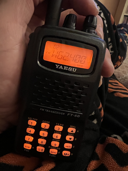 Handheld radio tuned to w62.400