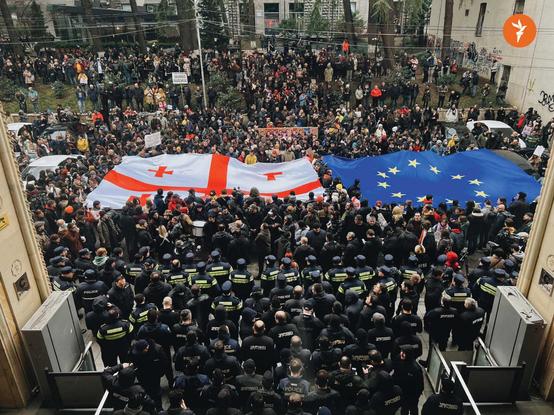 Huge EU and Georgia flags unfurled by protestors