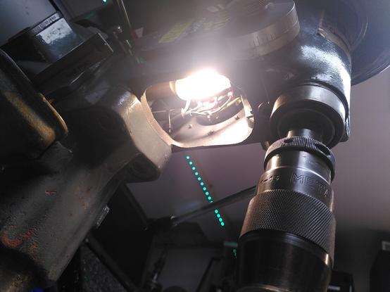 LED light bulb installed in drill press body