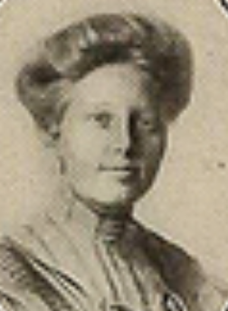 Quaesita Cromwell Drake from the 1910 yearbook of Vassar College; a young white woman with fair hair dressed in a bouffant updo