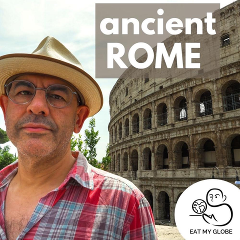 Simon Majumdar in front of the ruins of the ancient Roman Colosseum. Includes the text, “Ancient Rome.” Also includes the Eat My Globe logo of Simon Majumdar's likeness using the initials "S" and "M" holding a globe on a platter with the words, "Eat My Globe," underneath.