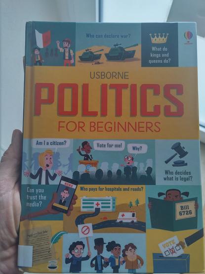 Photo od a book titles Politics for Beginners, explaining political concepts to children.