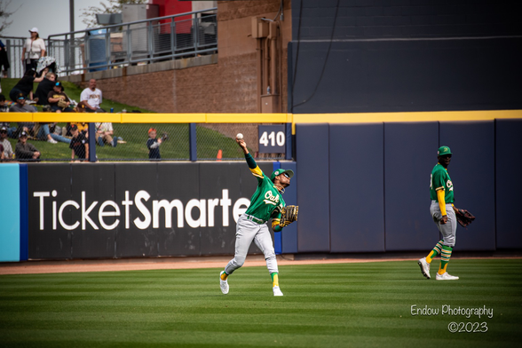 Oakland A’s outfielder Esteury Ruiz throws the ball back to the infield after making a nice running catch to n center field
