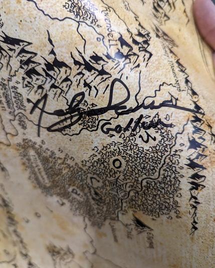 Andy Serkis' signature on a map of Middle Earth.