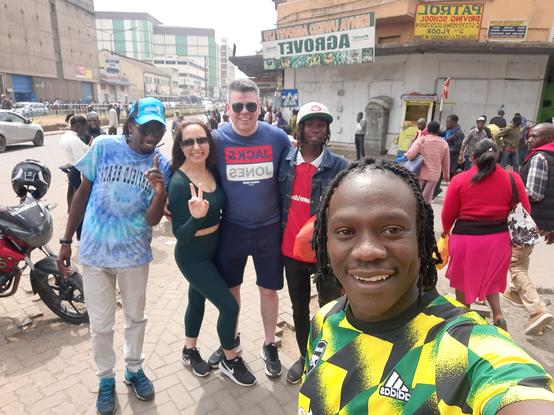 Myself and my wife Nicola with our guides, King, Keane, and Quick, in downtown Nairobi, Kenya.
