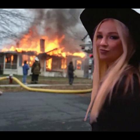 Disaster Girl meme, but it's Julia Hart.