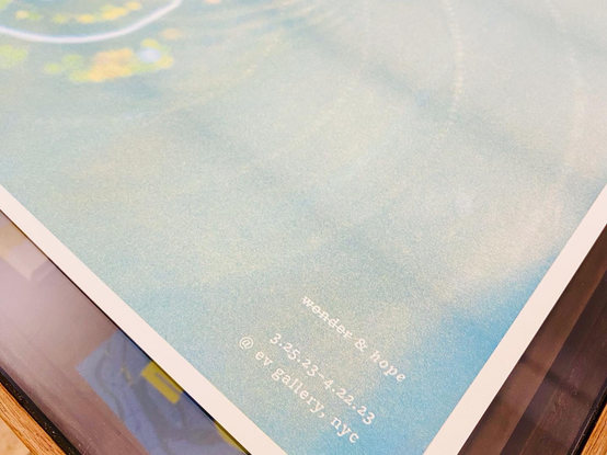 A close up of the riso print, zoomed into the show name (wonder & hope), dates (3/25-4/22) and location (EV gallery, nyc)