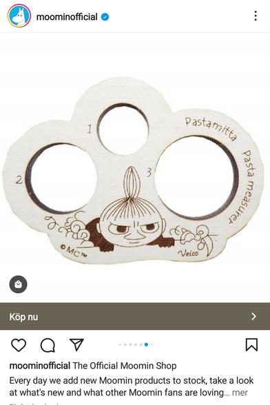 A laser cut piece of wood for measuring pasta with lilla my from Moomin on it. But it actually looks like a knuckle duster