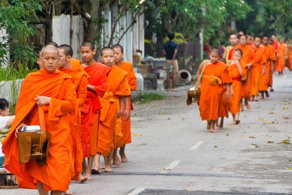 Buddhist monks collecting morning alms
